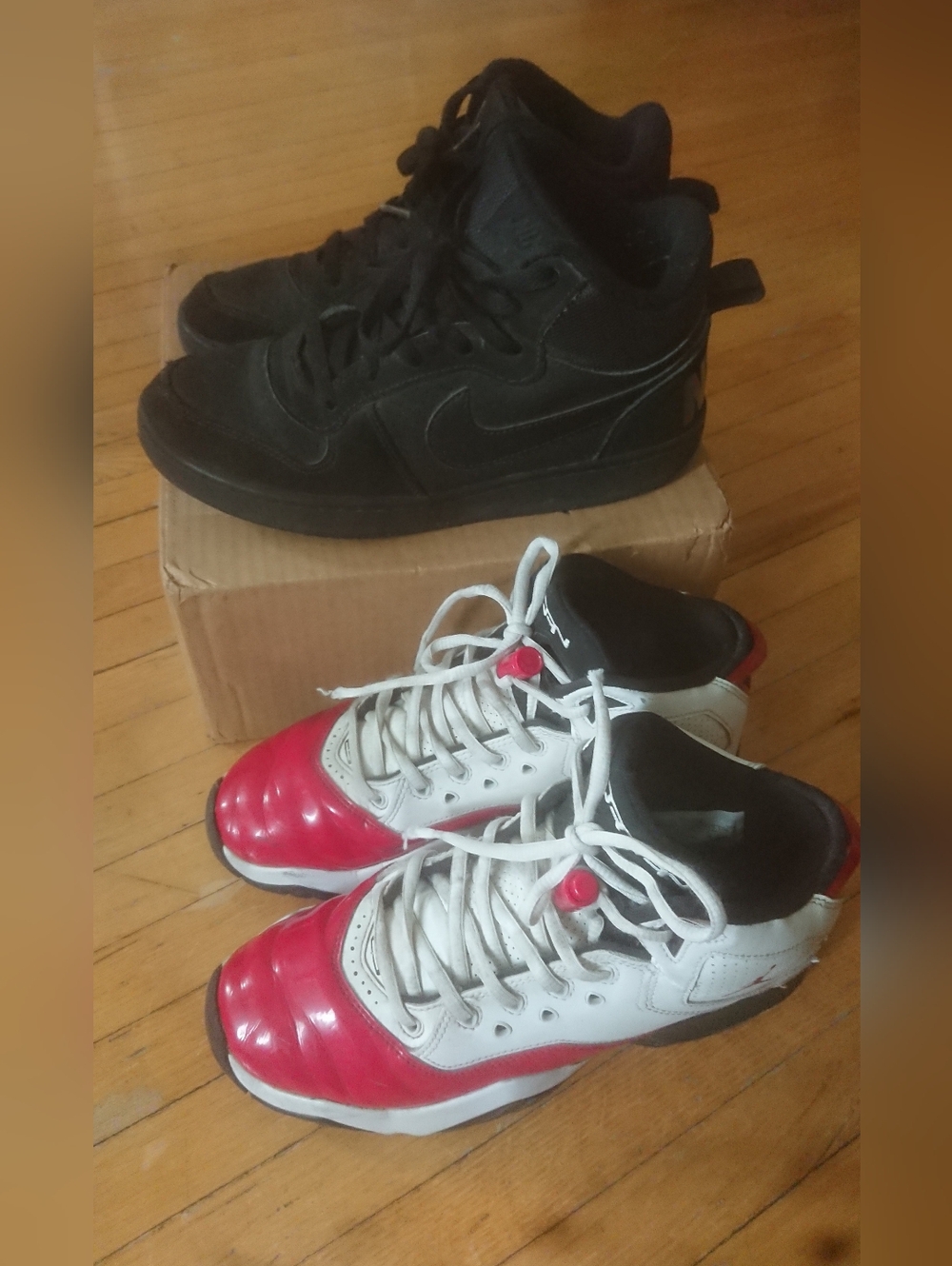 two pairs of Nike mid-top sneakers, size 5.5Y, EUR38